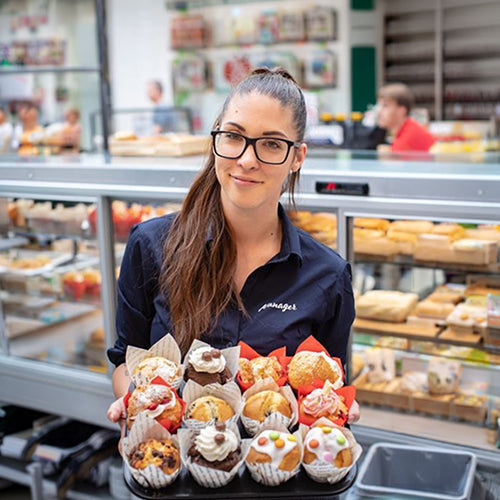 Freshly baked muffins served with a smile by Bakers + Baristas